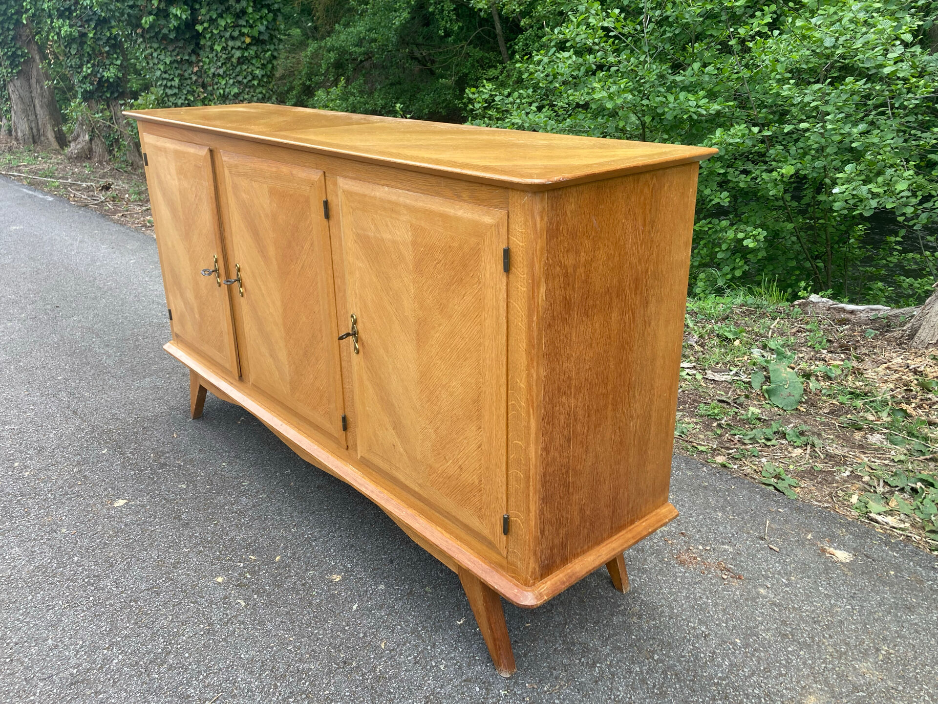 Vintage enfilade with tapered legs.