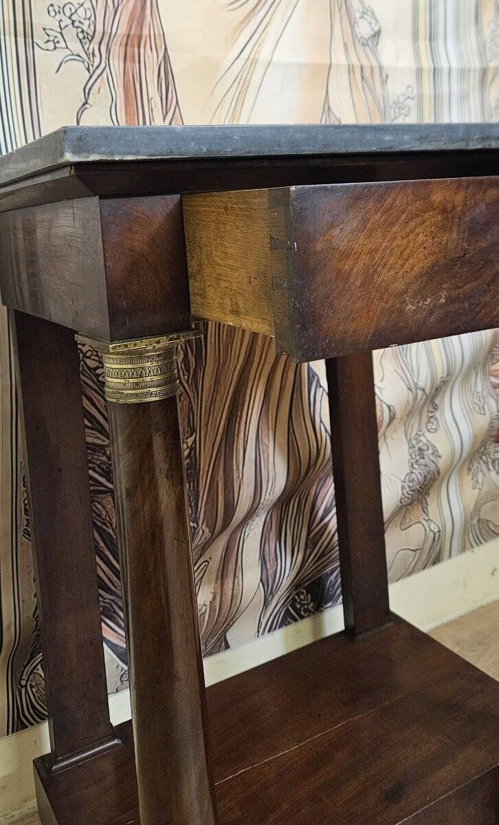 Console in mahogany and marble from the Empire period.