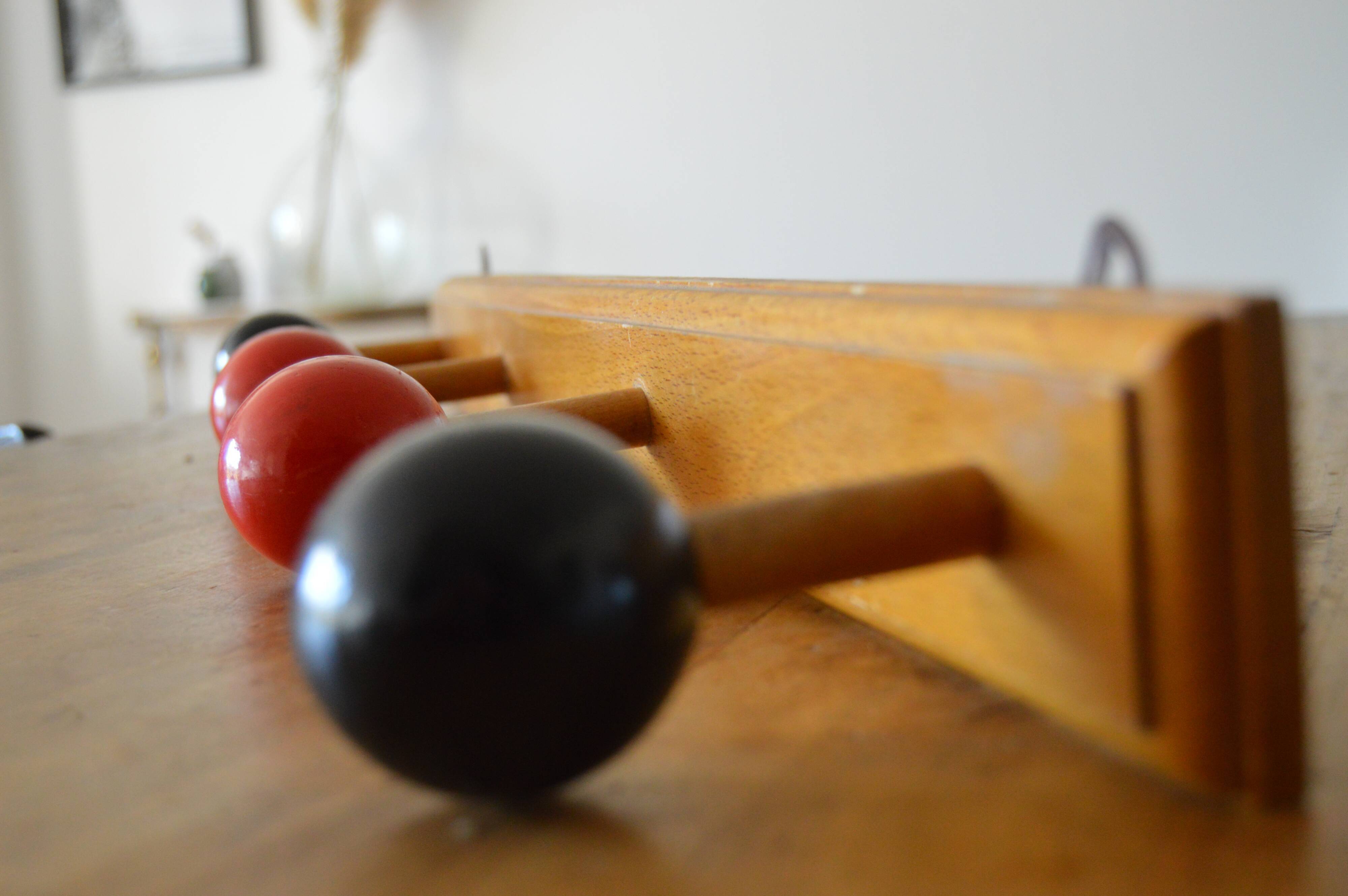 Vintage wooden hook with 4 racks painted red and black