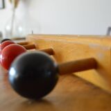 Vintage wooden hook with 4 racks painted red and black