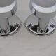 Pair of stainless steel coat racks from the 1970s.