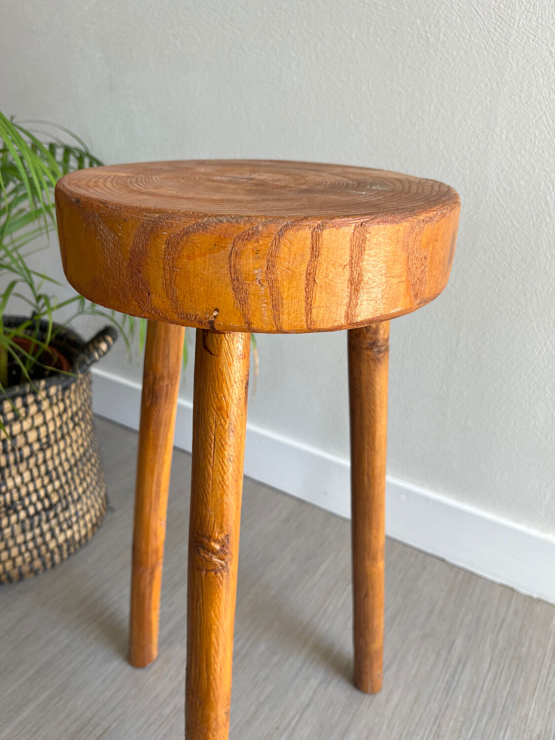 Tripod stool in a brutalist style