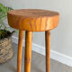 Tripod stool in a brutalist style