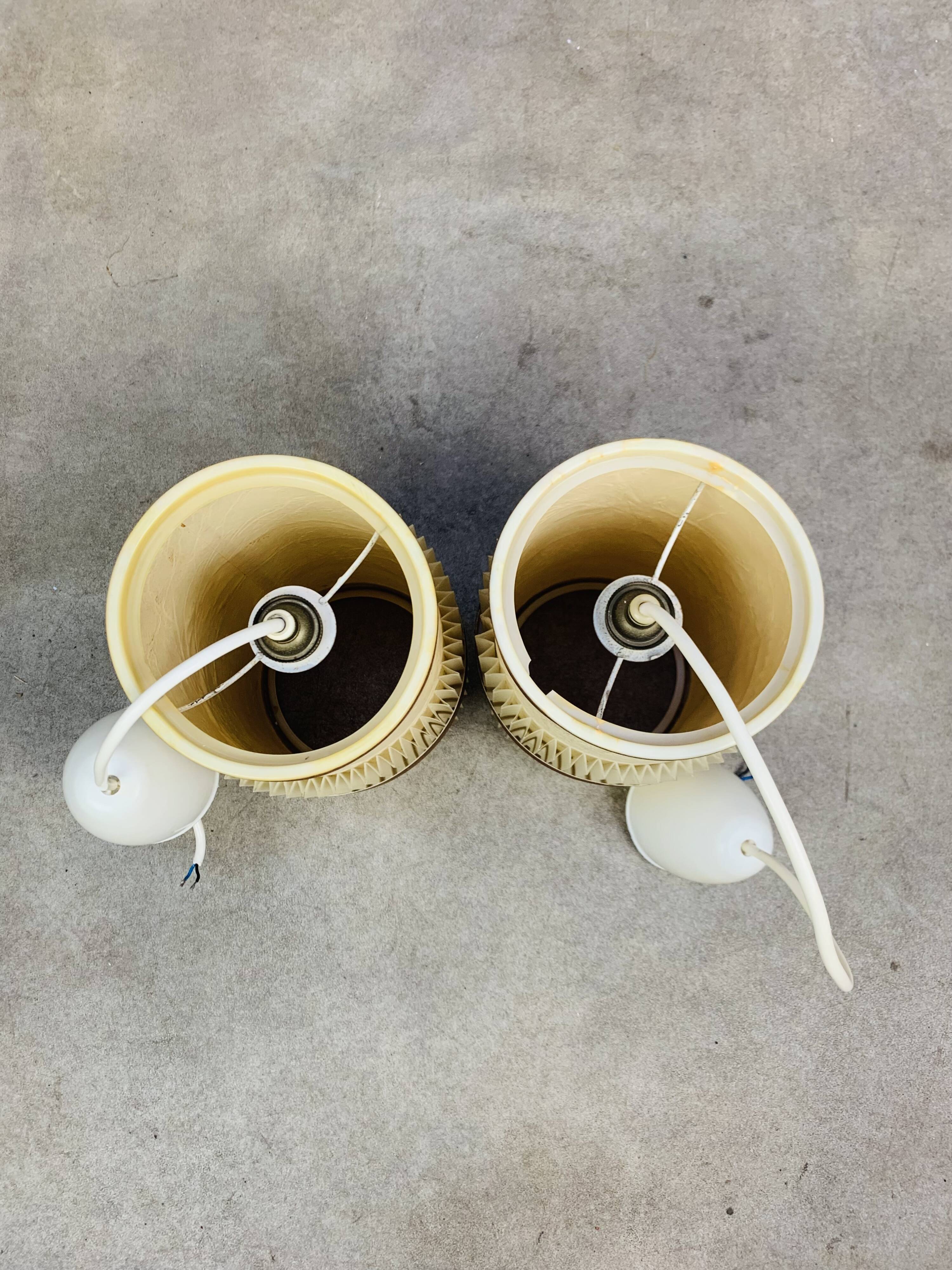 Pair of roller suspensions from the 70s, paper