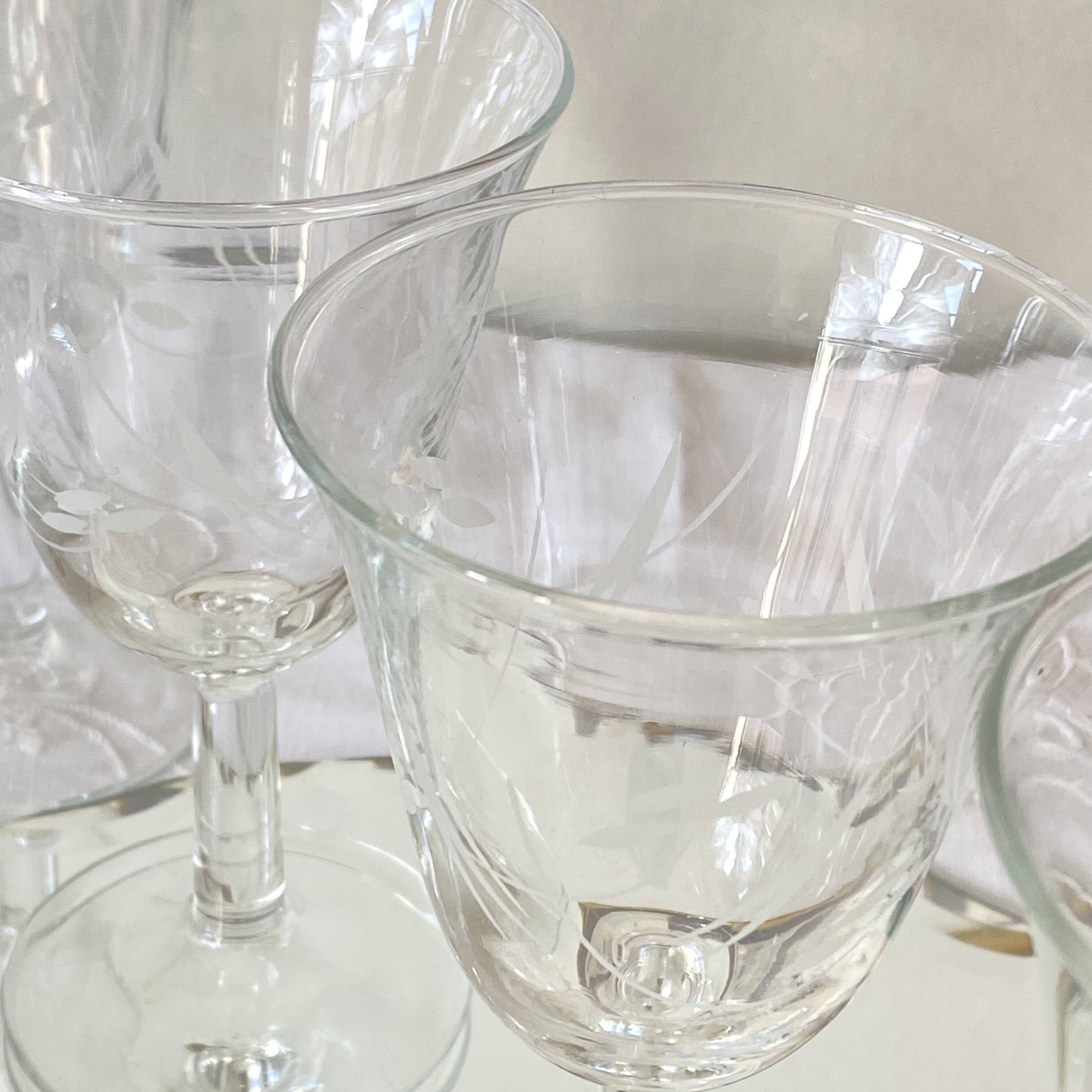 6 antique engraved stemmed glasses with stylised flowers, for wine or water.