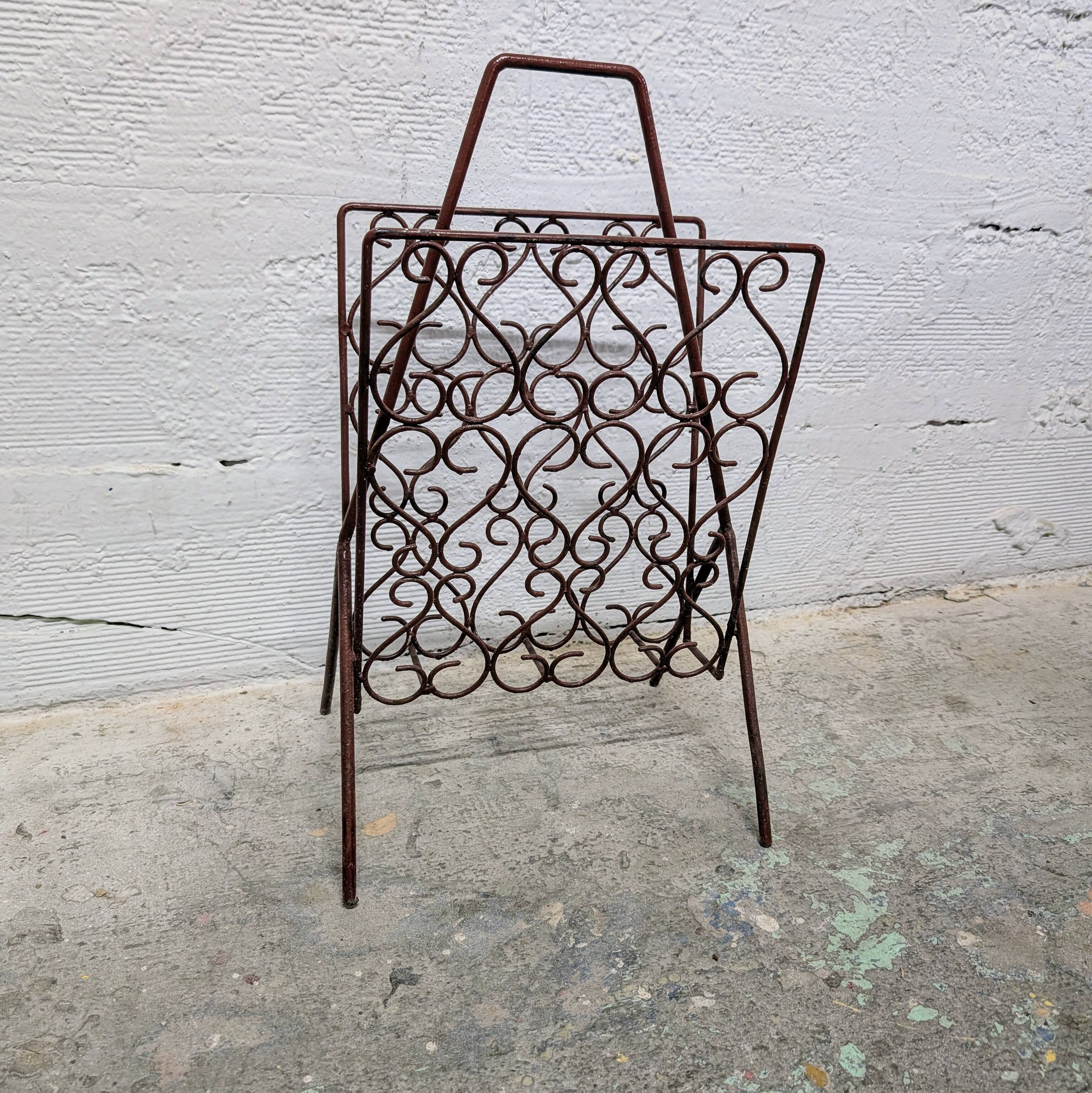 Vintage wrought iron magazine rack