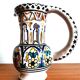 Deceptive pitcher in glazed earthenware