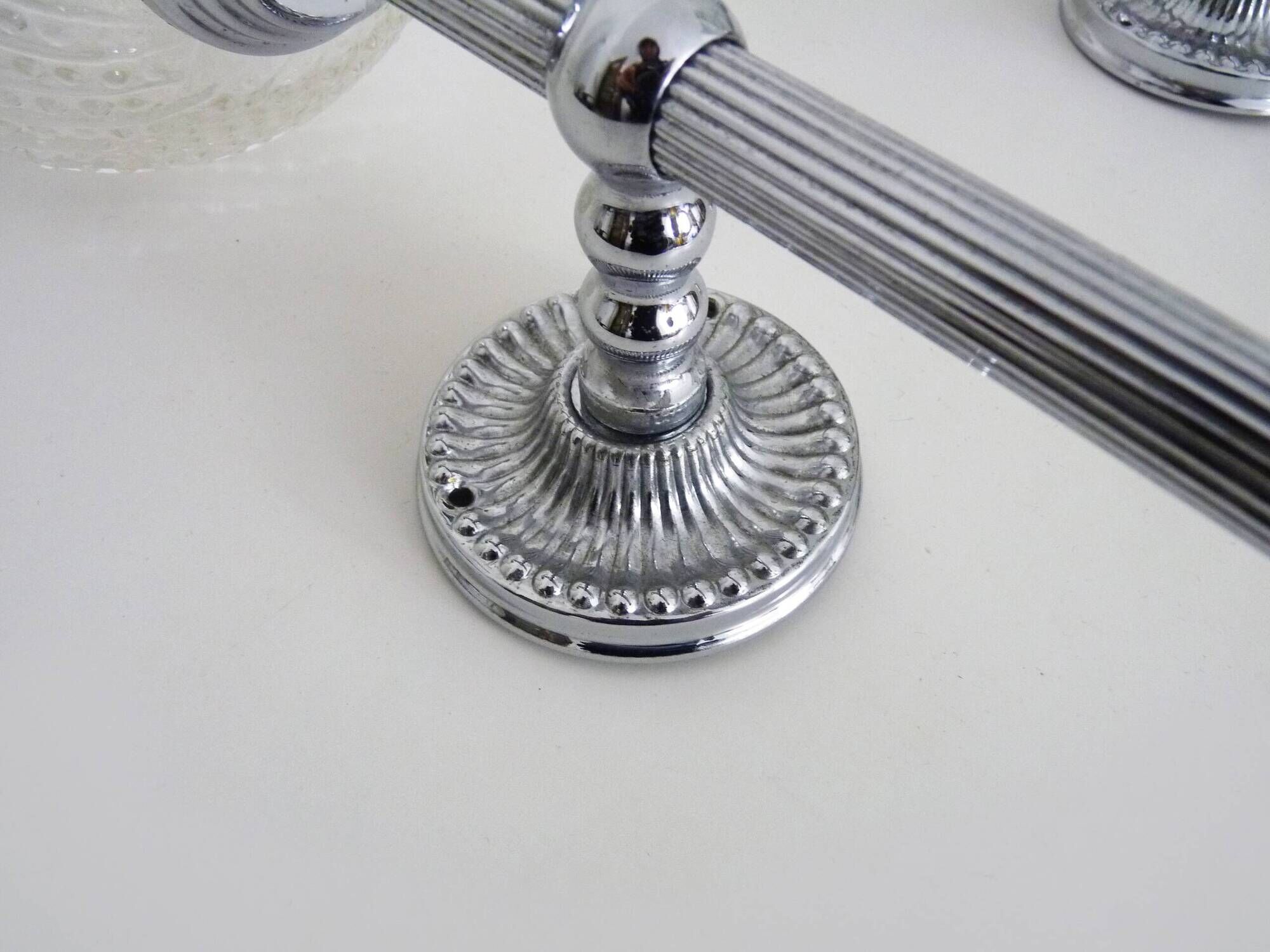 Pair of vintage Karl Lenz wall sconces. Chrome-plated metal and glass