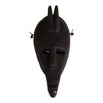 Zoomorphic African mask in wood, 70s