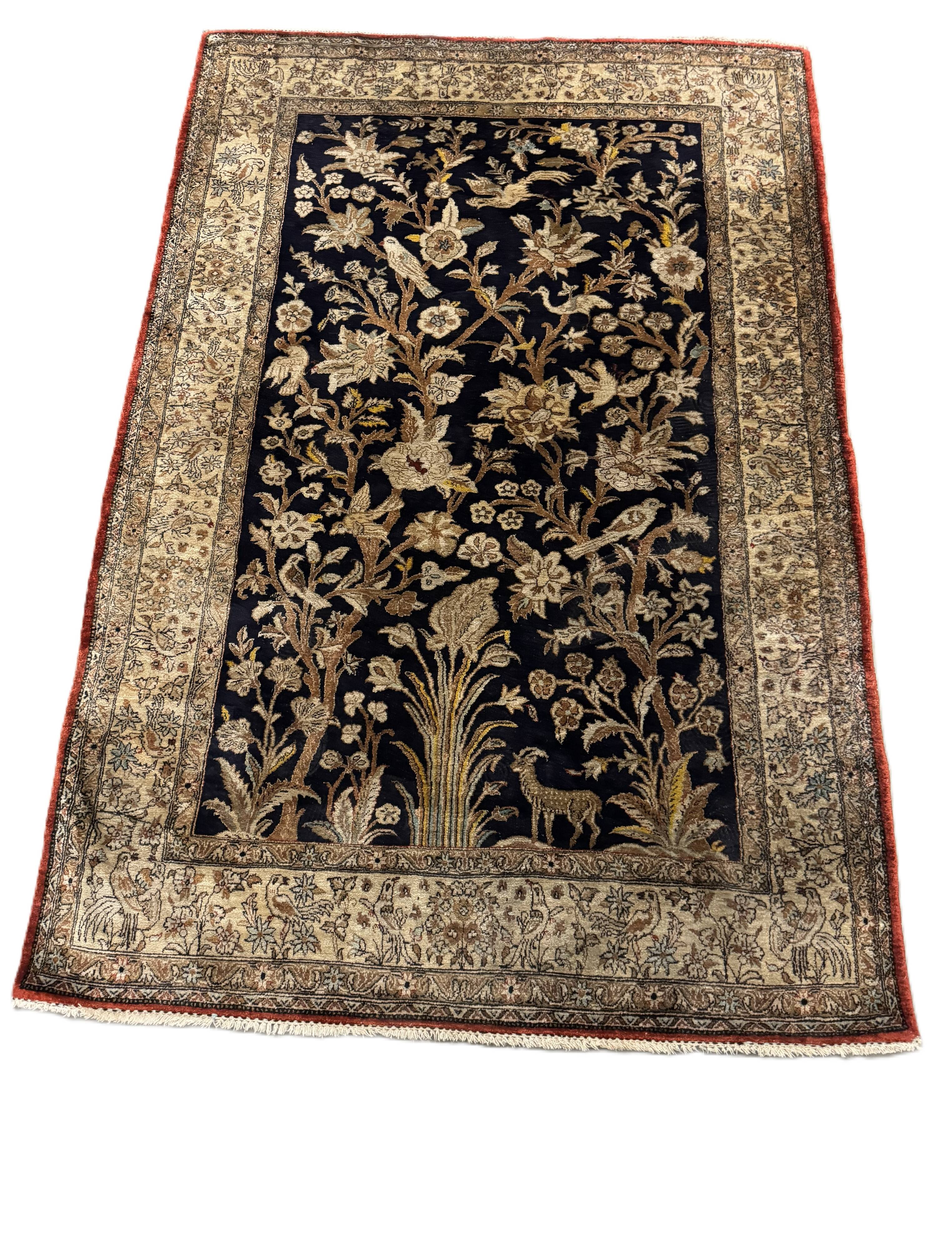 Handmade silk Persian carpet