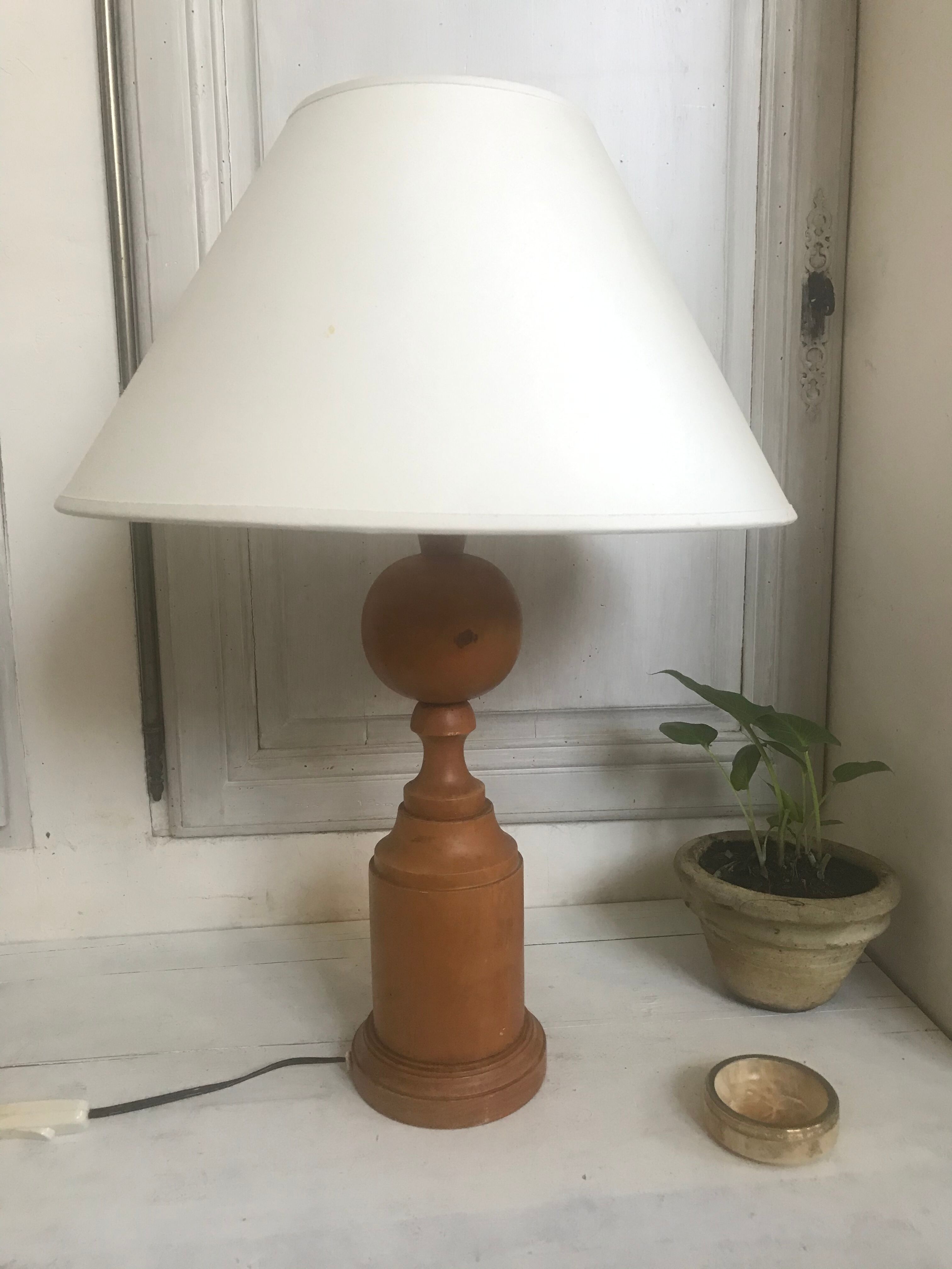 Turned wooden lamp