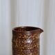 Textured stoneware decanter