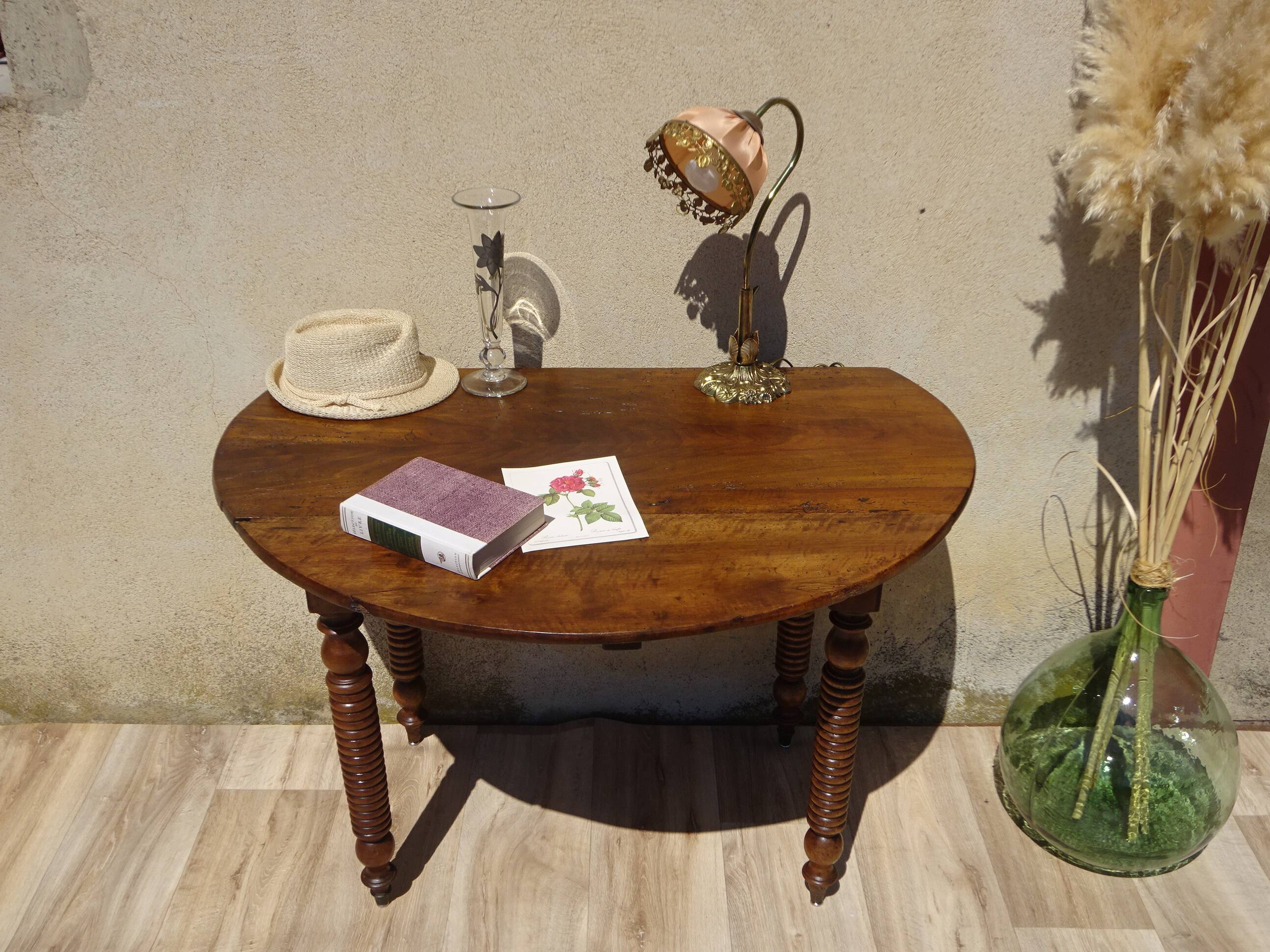 Antique walnut console table with honey spoon legs.