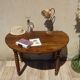 Antique walnut console table with honey spoon legs.