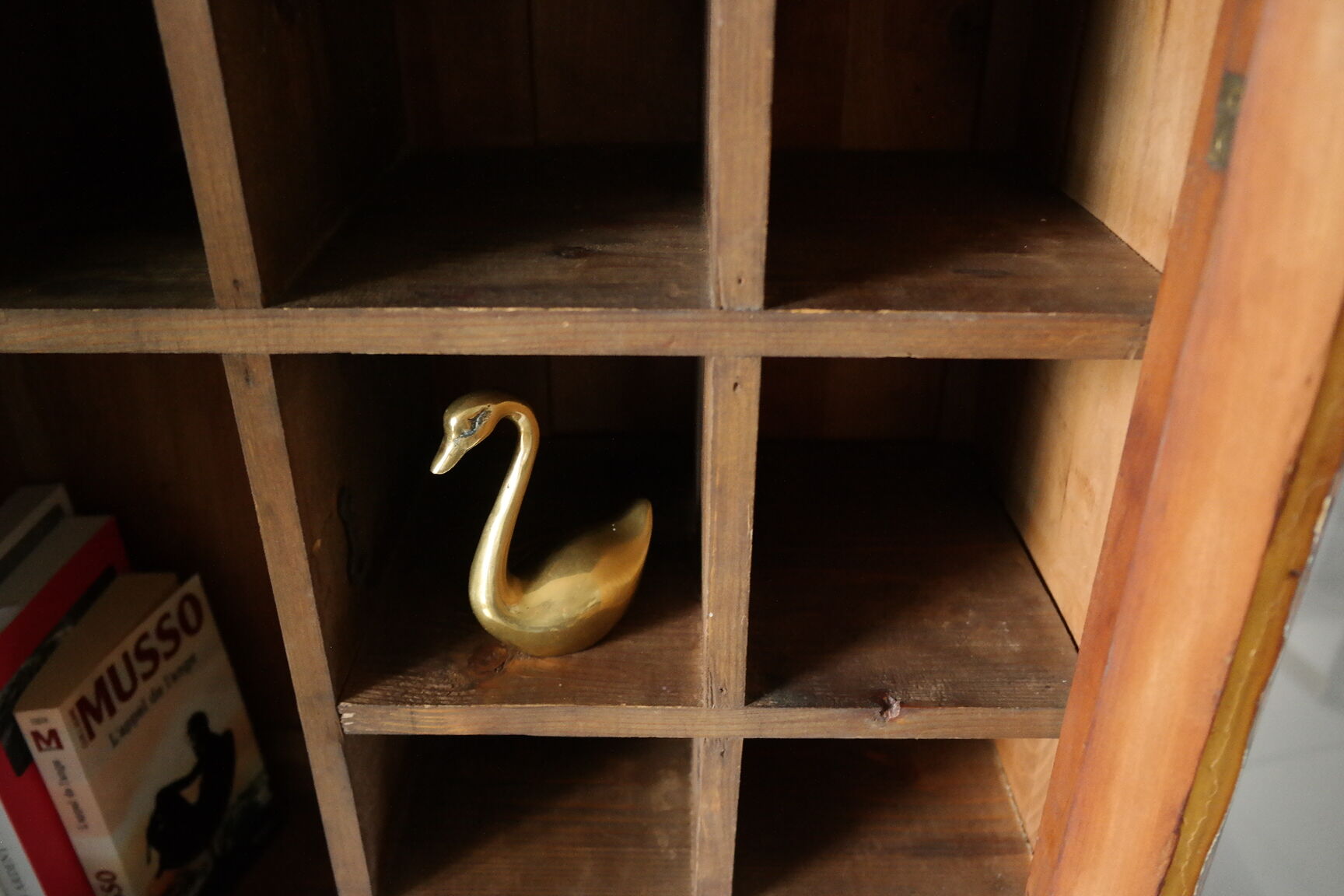 Antique walnut display cabinet from the 20th century.