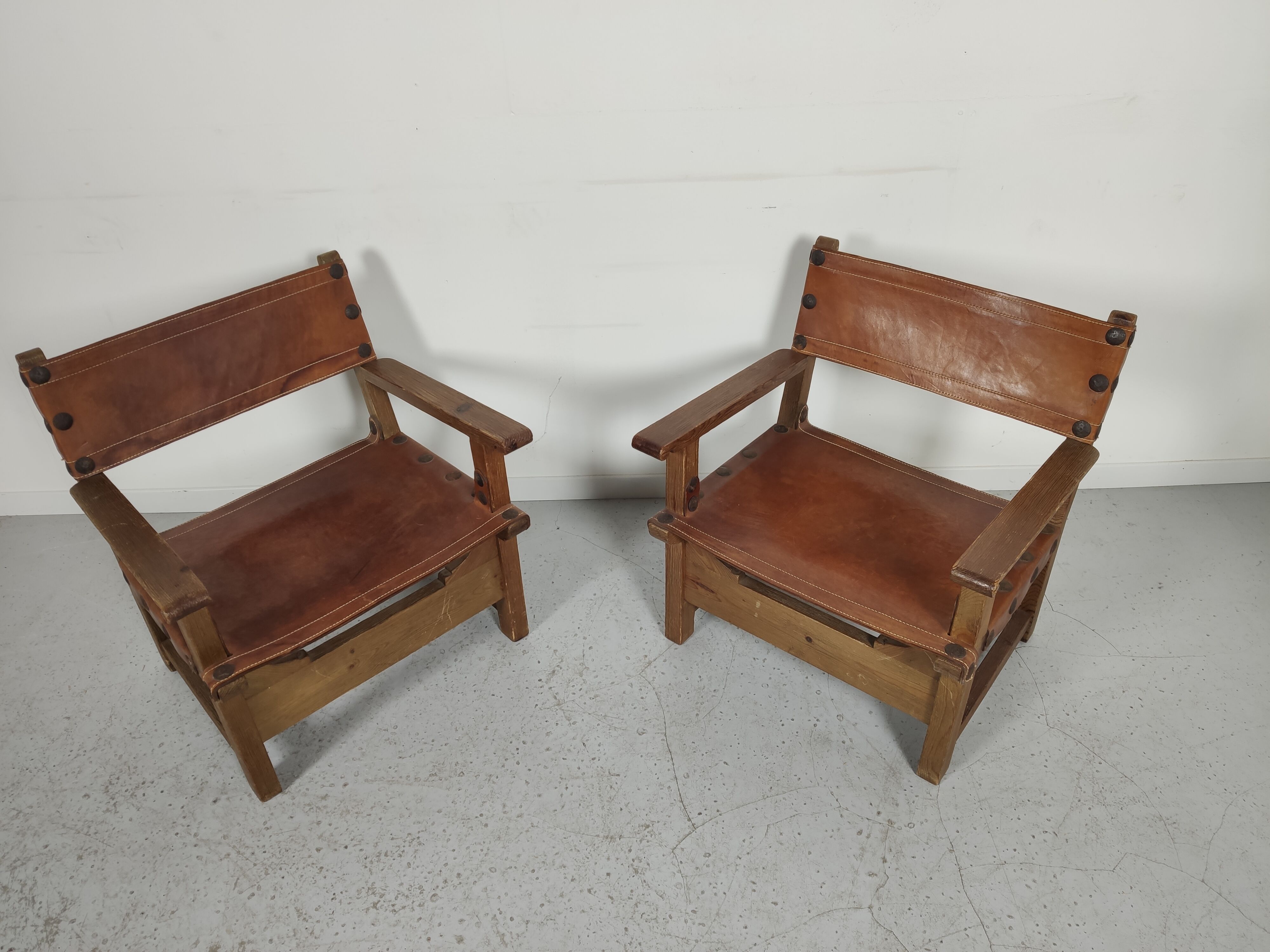Pair of Spanish vintage leather armchairs 1920/1930