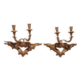 Pair of antique wall sconces in gilded wood from the 19th century.