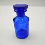 Old perfume bottle in cobalt blue glass