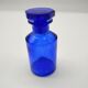 Old perfume bottle in cobalt blue glass