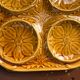 Vintage ochre earthenware artichoke dish, 6 compartments, relief flowers.