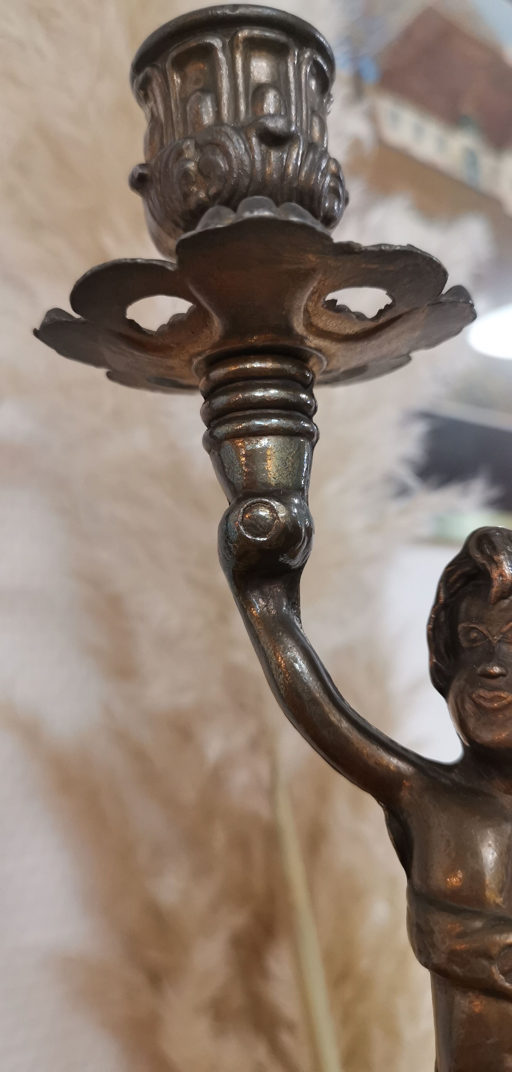 Pair of antique candlesticks in bronze and brass