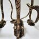 Four patères bronze patinated leafy décor early 20th century