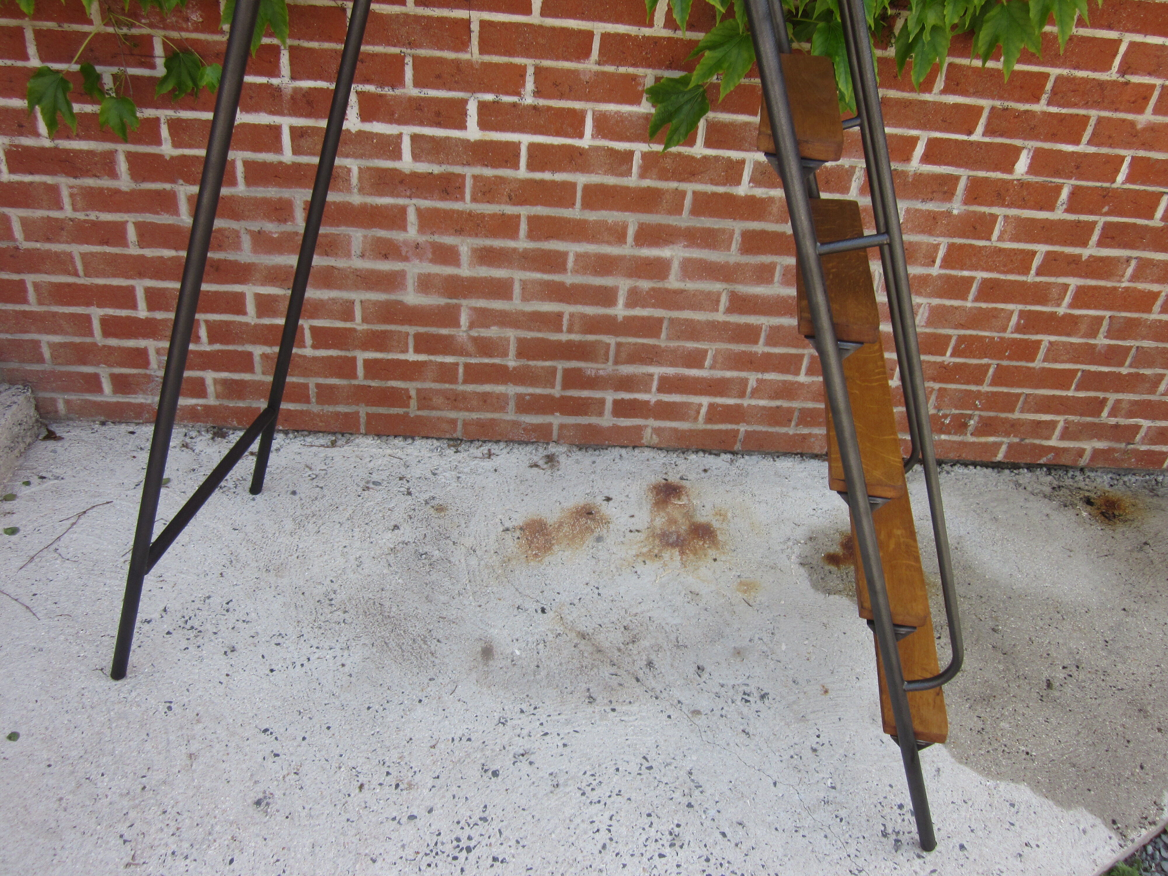 Old stepladder in metal and wood