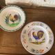 Two collection plates hand-painted rooster pattern signed fab Quimper and wolf mill hamage