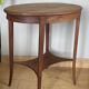 Oval Art Deco pedestal table in oak early twentieth century