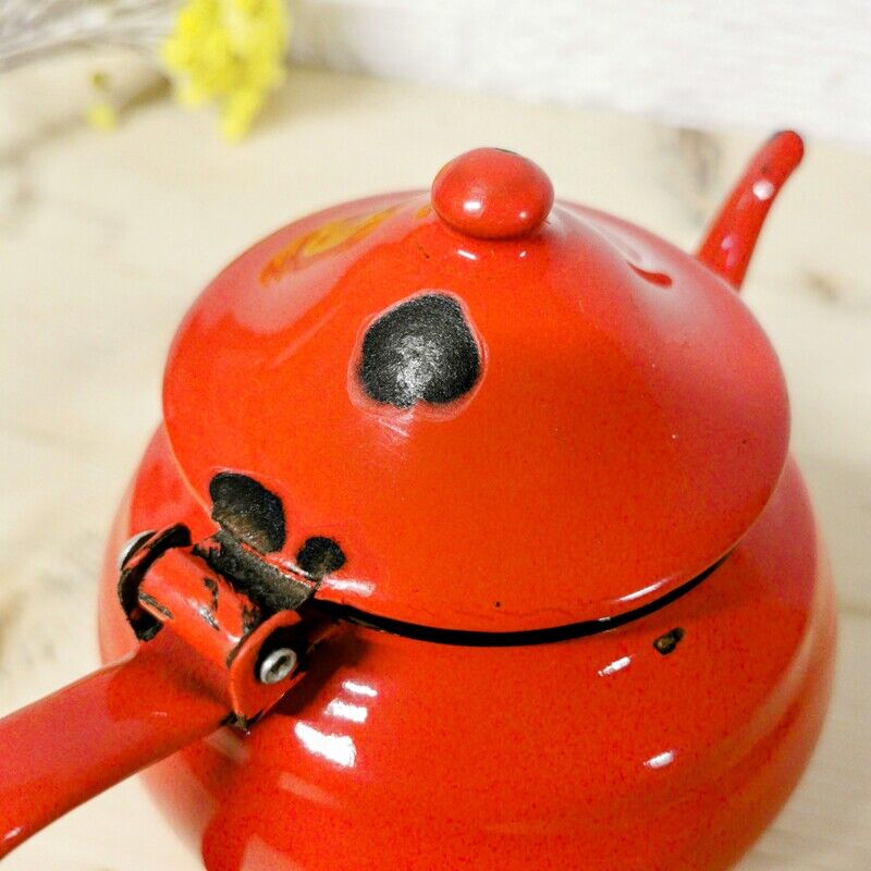 Red enamelled teapot