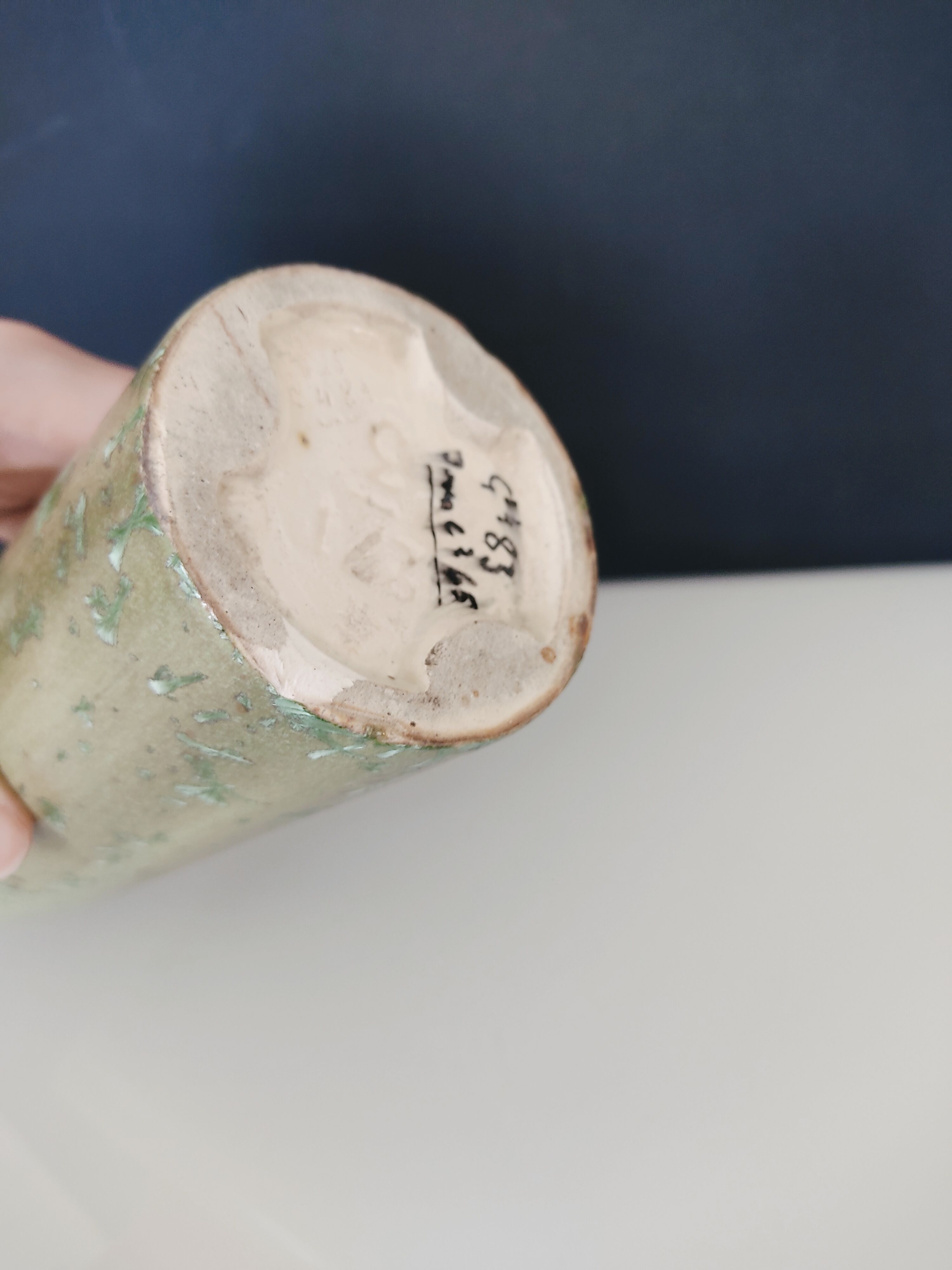 Pale green ceramic roller vase