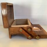Old wooden cigarette box and ashtray