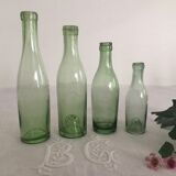 Set of 4 old thick glass bottles