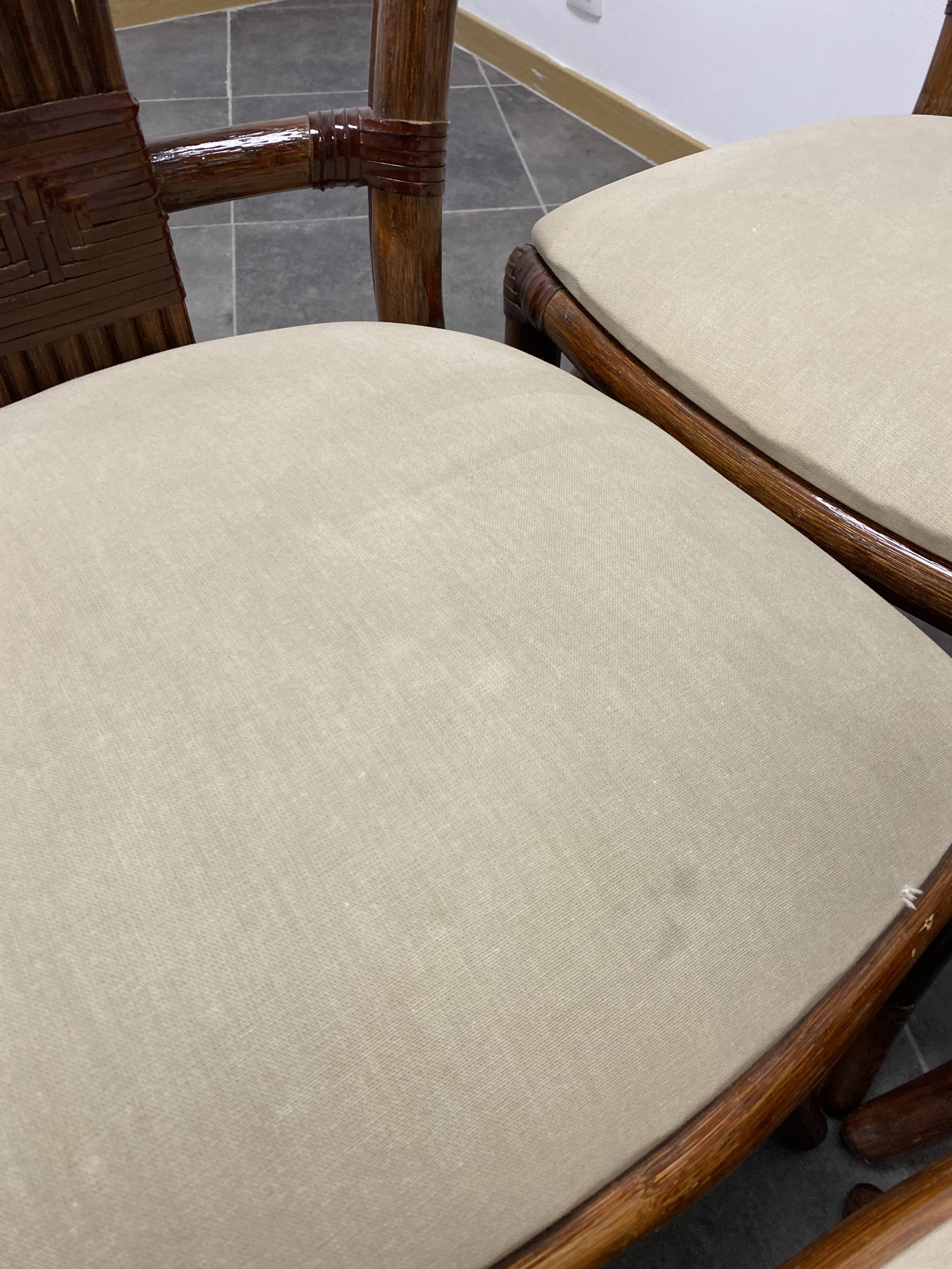 4 vintage woven rattan chairs