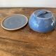 Cheese or butter bell and its blue sandstone dish