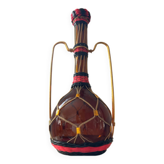 Vintage scoubidou bottle in amber glass