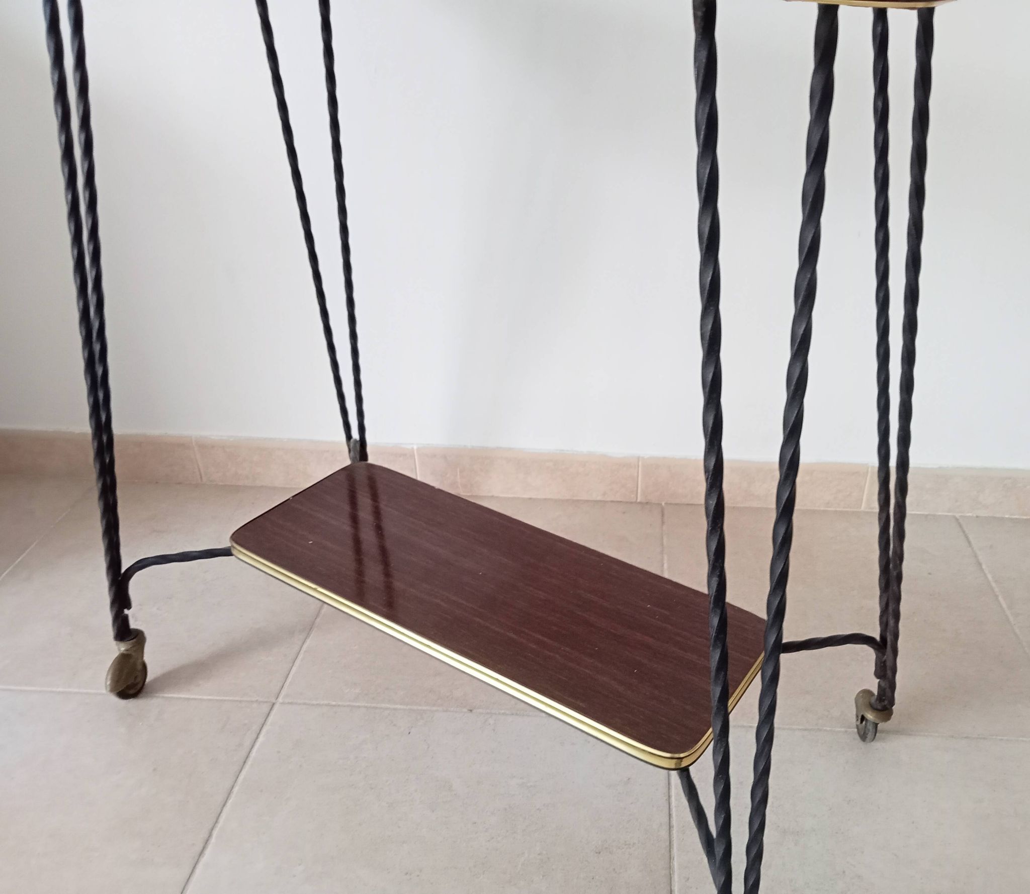 Vintage Formica and wrought iron rolling dessert trolley/side table.