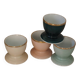 Four coloured egg cups with a golden rim from the 50s.