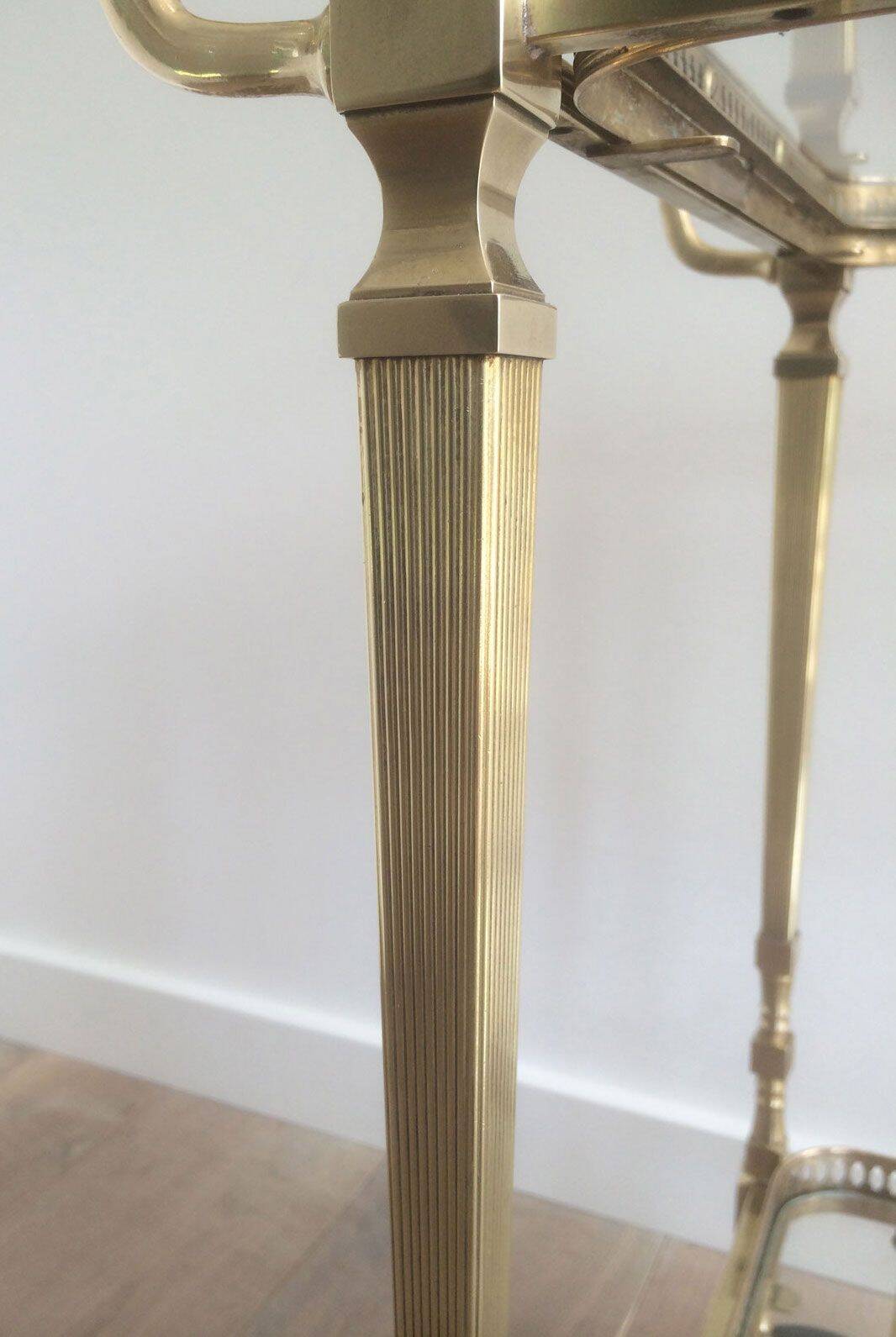 Brass rolling table from the Baguès house.