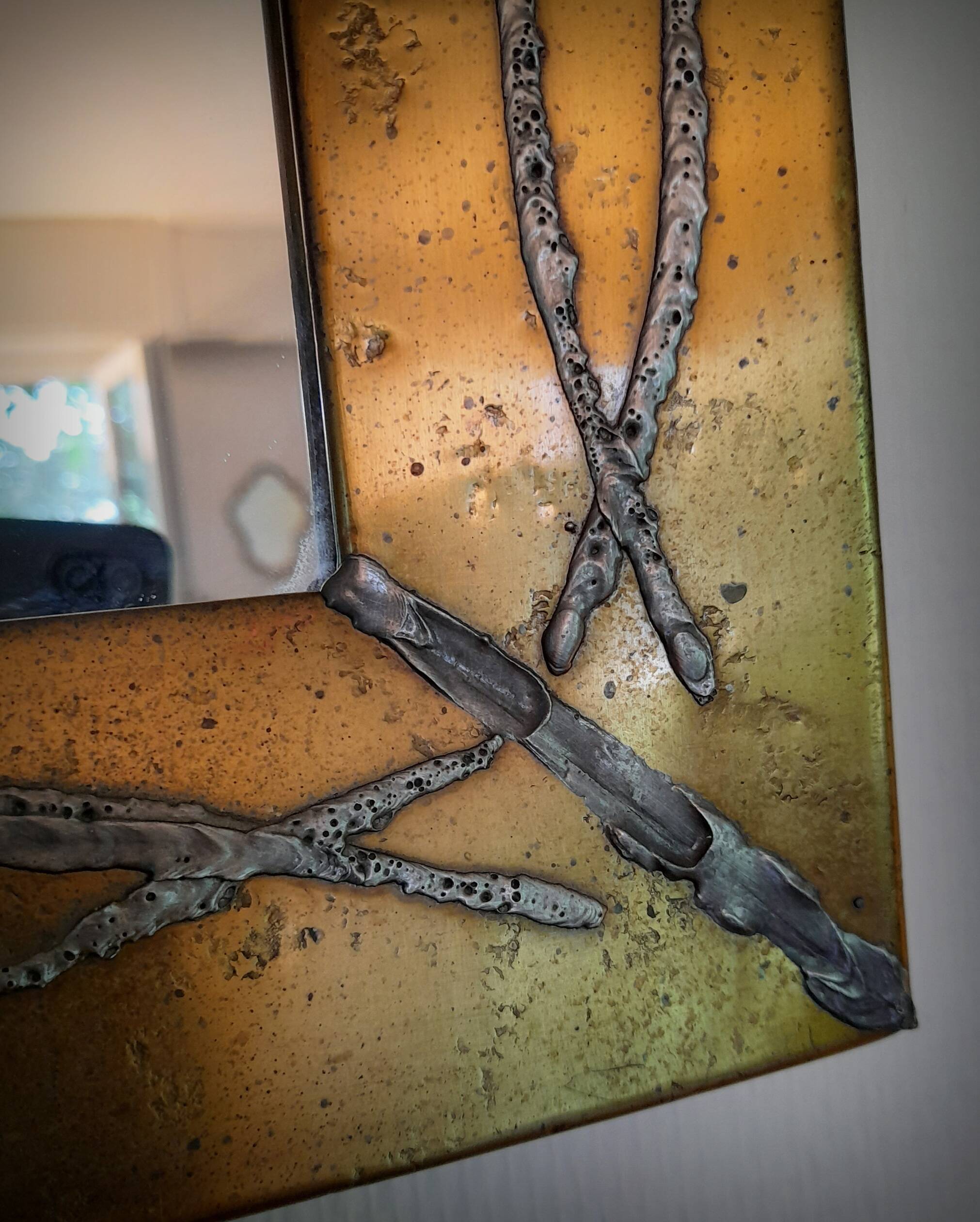 Brutalist brass mirror by Jean Goardere, France, 1970s