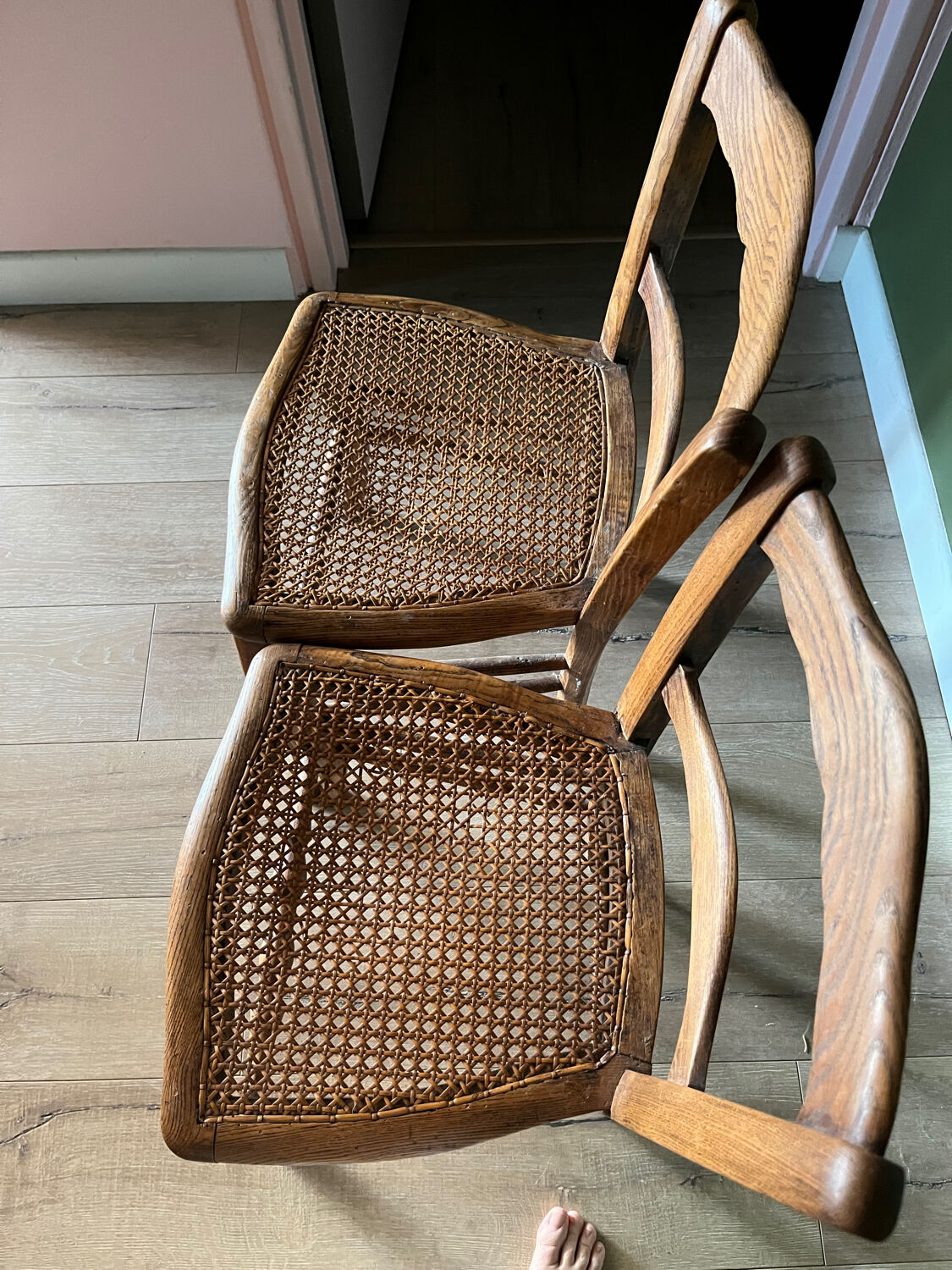 Pair of vintage chairs from the late 20th century with caning.