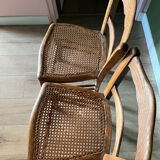 Pair of vintage chairs from the late 20th century with caning.