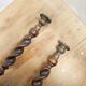 Paire de bougeoirs anciens en bois et bronze
