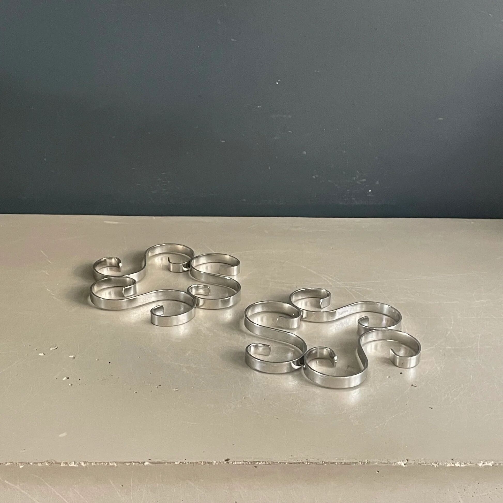 Pair of stainless steel trivets