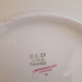 Set of porcelain dessert plates with flower patterns