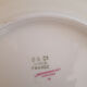 Set of porcelain dessert plates with flower patterns