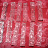 Set of twelve crystal knife holders in their box