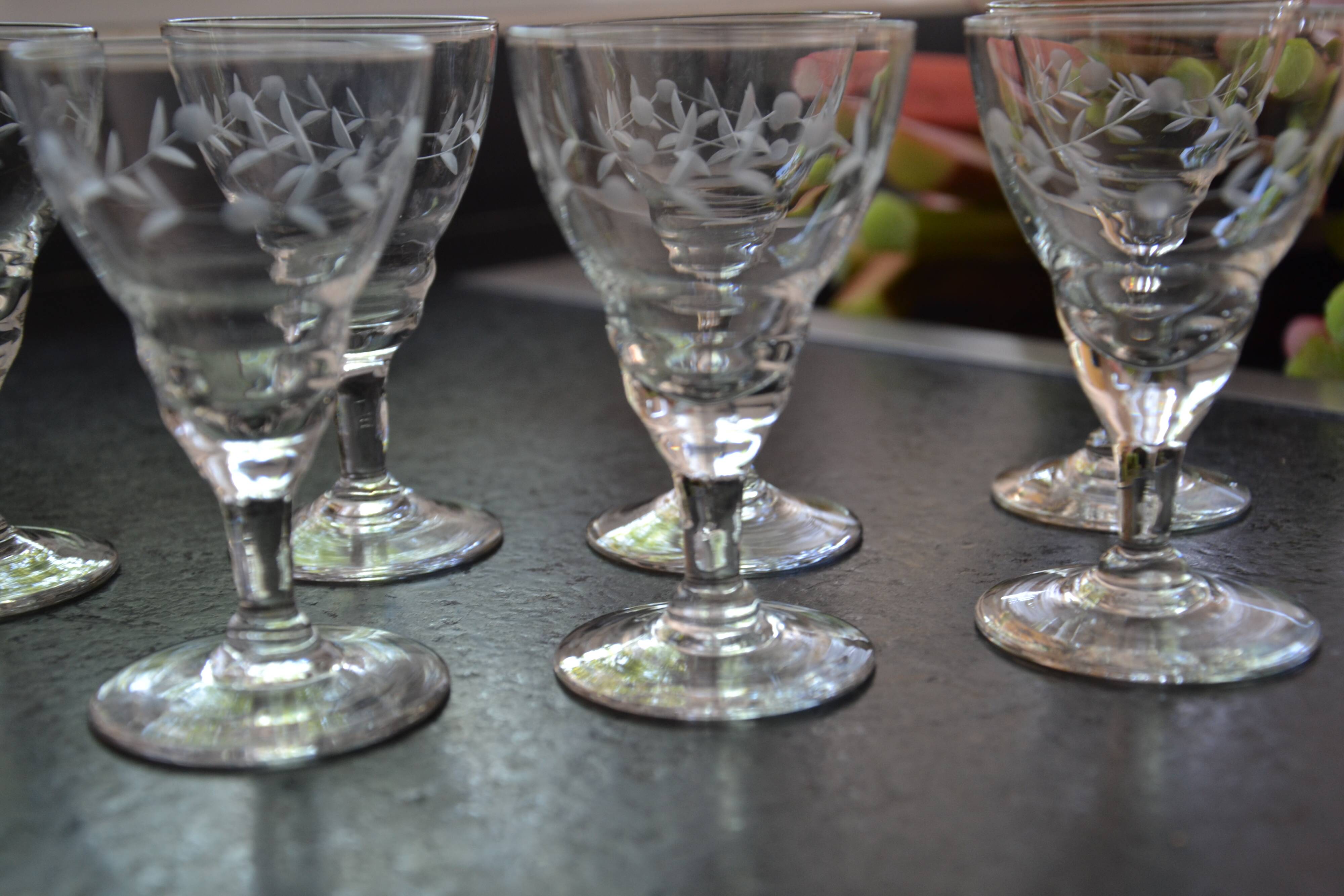 8 small old chiseled glasses