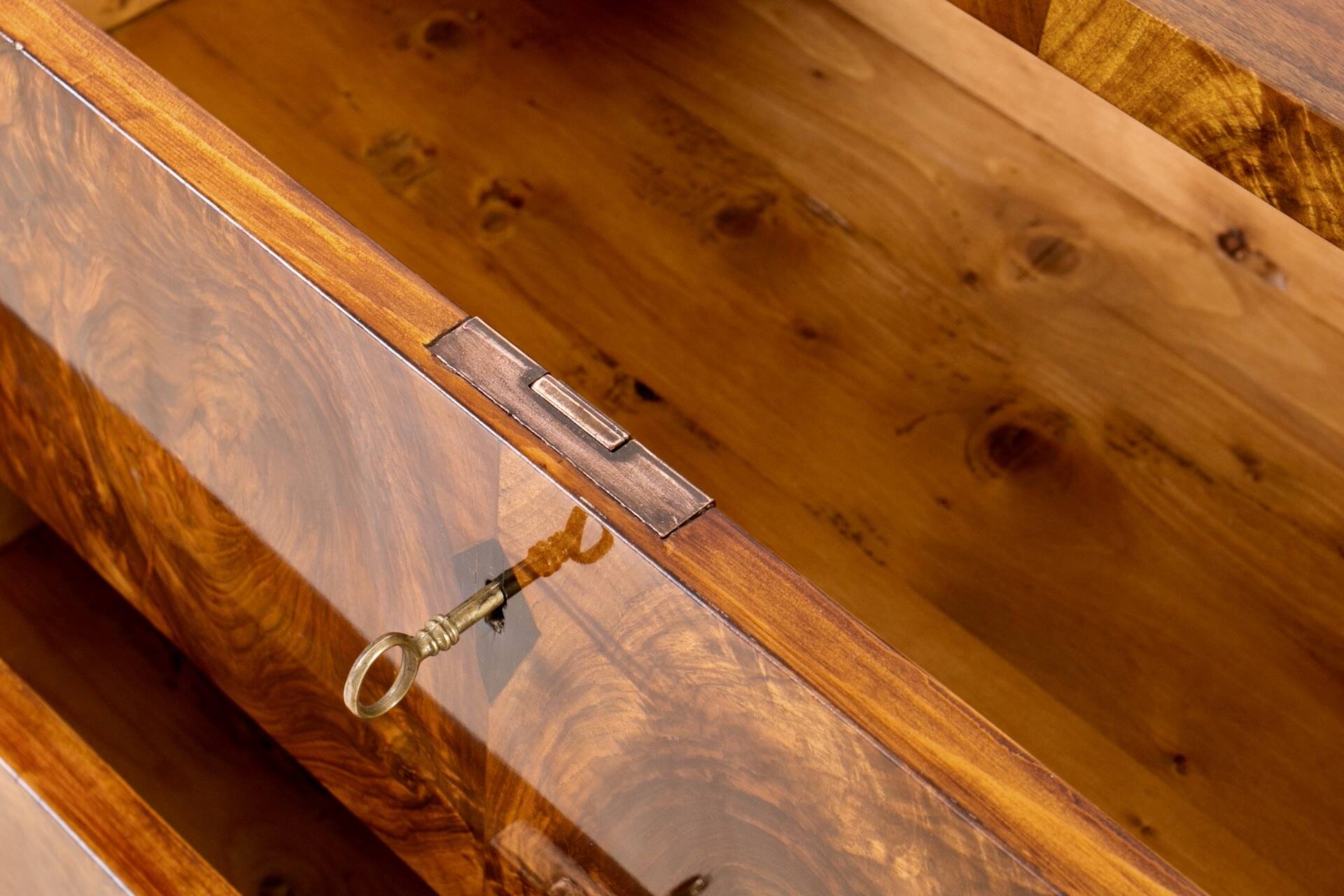 Elegant pair of Biedermeier style walnut commodes, Germany, French polish.