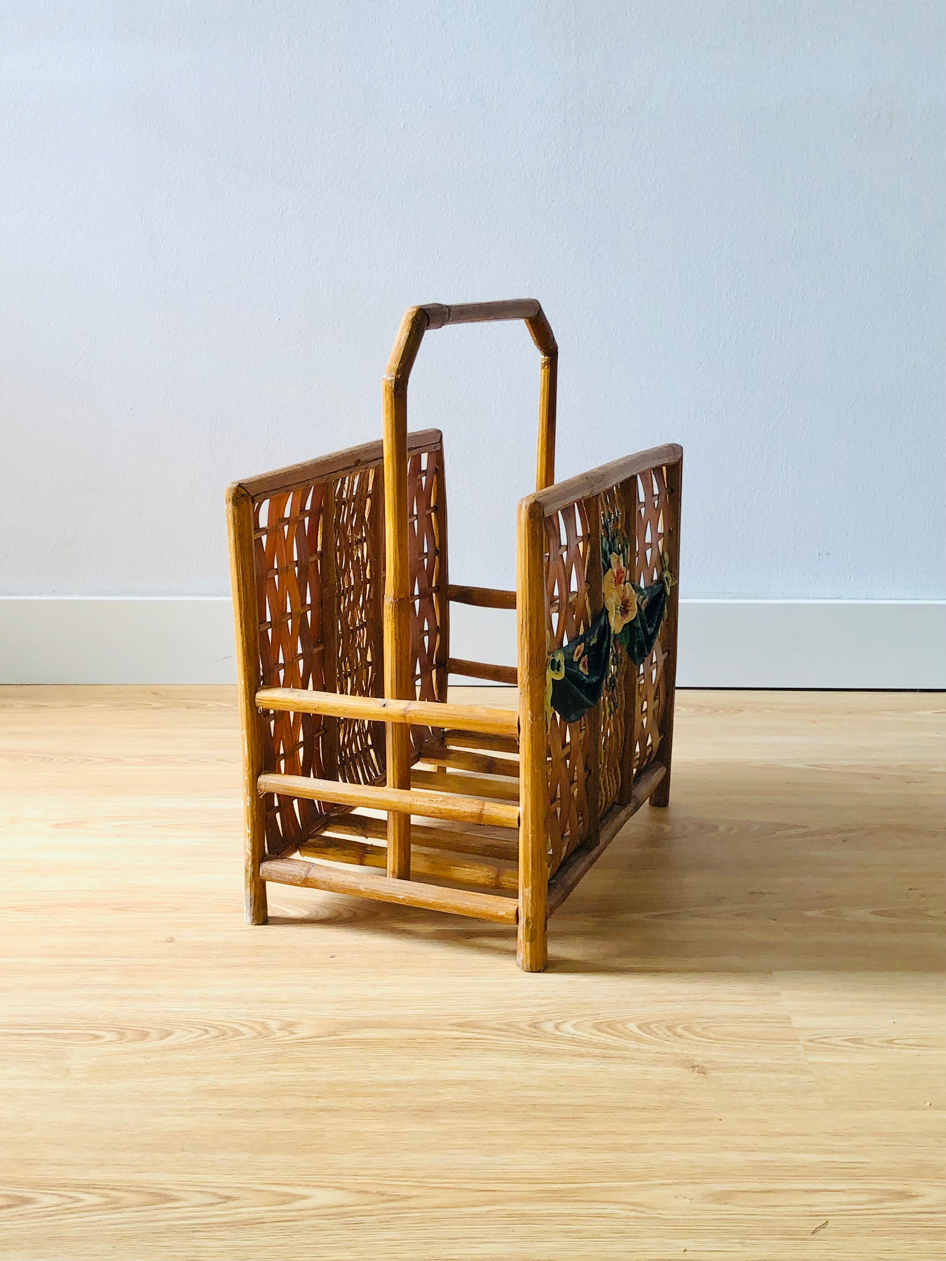 Vintage rattan magazine holder with floral decoration